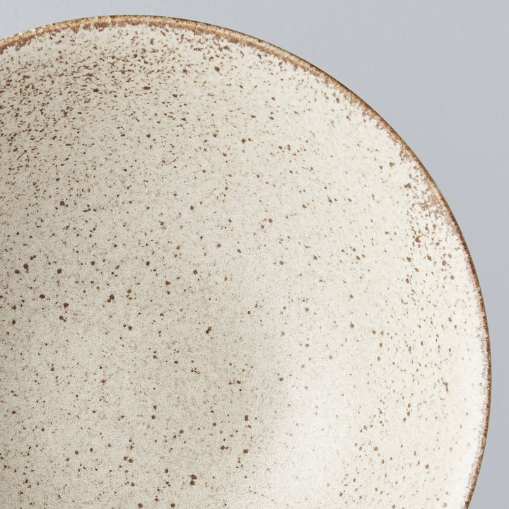 Save on Sand Fade Open Bowl Made in Japan at BEON. 22cm diameter x 6cm height Open bowl in Sand Fade design. The Sand Fade Glaze features a warm, sandy tone with touches of hazel brown. Each piece has a unique speckled pattern determined by its position in the kiln during the firing process. This bowl is perfect to serve salads or to use for curries, noodles and risottos. Handcrafted in JapanMicrowave and dishwasher safe