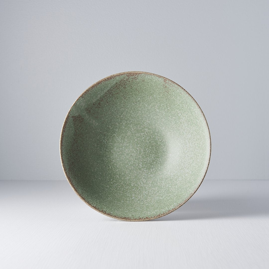 Save on Green Fade Open Bowl Made in Japan at BEON. 22cm diameter x 6cm height Open bowl in Green Fade design. The Green Fade glaze features a lush, forest green tone with button-flower blue highlights and an edge of light brown. Each piece has a unique dappled pattern determined by its position in the kiln during the firing process. The beautifully shaped bowl can be used for noodles, soups, salads, pasta and risottos Handcrafted in Japan. Microwave and dishwasher safe.