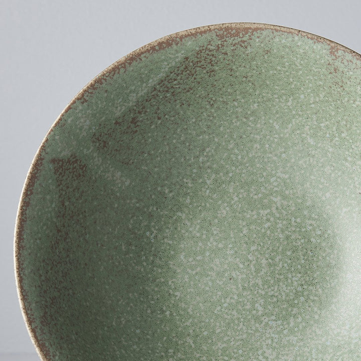 Save on Green Fade Open Bowl Made in Japan at BEON. 22cm diameter x 6cm height Open bowl in Green Fade design. The Green Fade glaze features a lush, forest green tone with button-flower blue highlights and an edge of light brown. Each piece has a unique dappled pattern determined by its position in the kiln during the firing process. The beautifully shaped bowl can be used for noodles, soups, salads, pasta and risottos Handcrafted in Japan. Microwave and dishwasher safe.