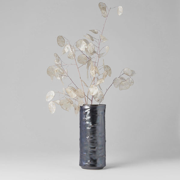 Save on Black & Silver Cylinder Vase Made in Japan at BEON. 8cm diameter x 19cm height Cylinder vase in Black and Silver design. Use as a vase for flowers or as a decorative piece. Handmade in JapanDishwasher safe