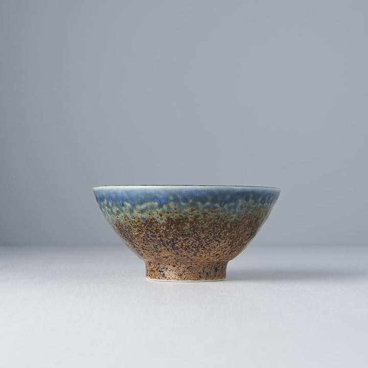 Save on Earth & Sky Medium Bowl Made in Japan at BEON. 16cm diameter x 7.5cm height Medium Bowl in Earth & Sky design The Earth & Sky range features a hand-dipped edge of bold ink-blue contrasted with a speckled tawny brown. Use these bowls for sides, rice, dips or snacks. They are a great sized bowl for breakfast cereals and desserts. Handcrafted in JapanMicrowave and dishwasher safe