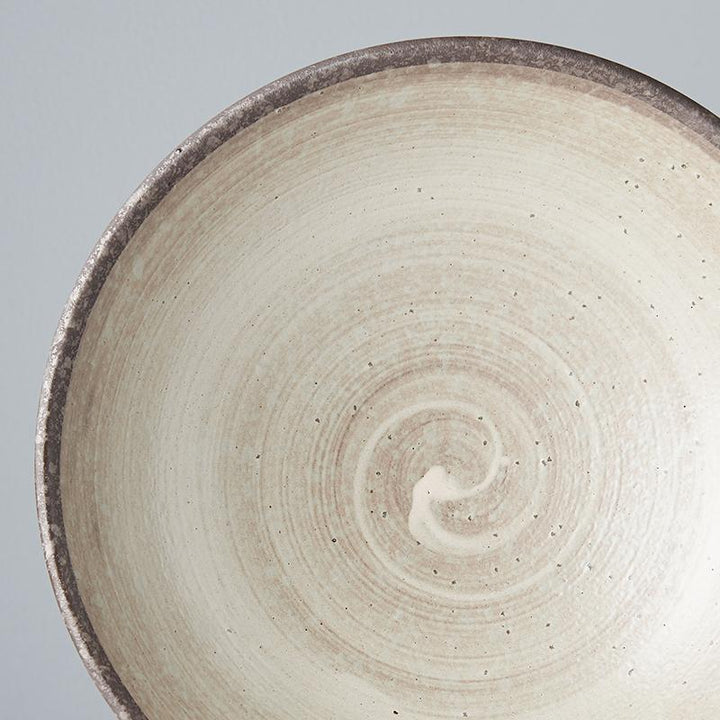 Save on Nin-Rin Ramen Bowl Made in Japan at BEON. 25cm diameter x 8cm height Ramen Bowl in Nin-Rin design The Nin-Rin range features a circular sweep of golden ochre over the signature 'Earth' glaze. No two pieces are the same due to a unique hand glazing technique used to create the swirling pattern. Traditionally used for ramen, this bowl can be used for curries, risottos, salads or pasta. The ramen bowl makes a great engagement or wedding gift. Handcrafted in JapanMicrowave and dishwasher safe