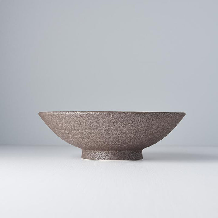 Save on Nin-Rin Ramen Bowl Made in Japan at BEON. 25cm diameter x 8cm height Ramen Bowl in Nin-Rin design The Nin-Rin range features a circular sweep of golden ochre over the signature 'Earth' glaze. No two pieces are the same due to a unique hand glazing technique used to create the swirling pattern. Traditionally used for ramen, this bowl can be used for curries, risottos, salads or pasta. The ramen bowl makes a great engagement or wedding gift. Handcrafted in JapanMicrowave and dishwasher safe