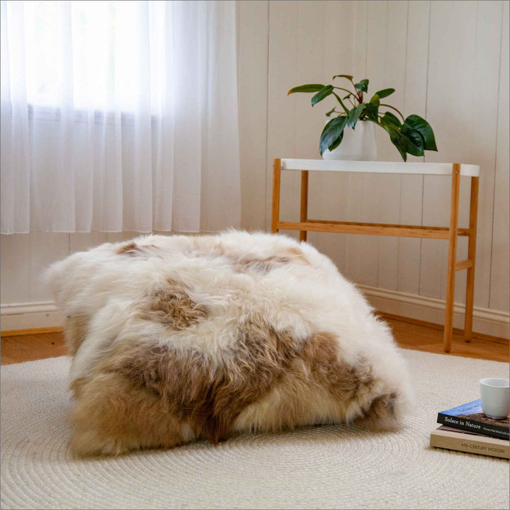 Buy Lhasa Floor Cushion | Lhasa Floor Cushion by Fibre at BEON | Himalyan Longwool Sheepskin Cushion with zipper, 100% polyester cushion inner, microsuede base. Size The perfect combination of luxurious comfort and style, this cushion helps bring a sophis