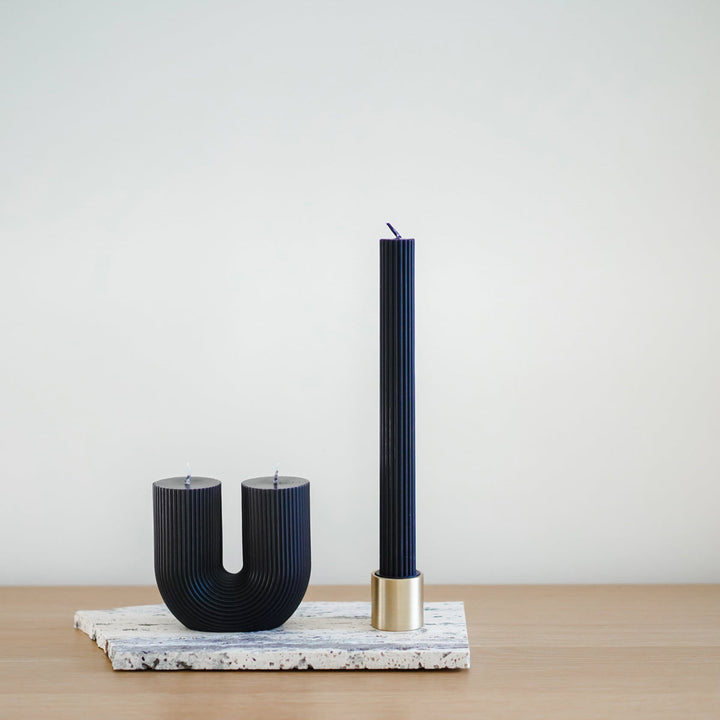 Curl Curl Candle - Black Pillar Candle Available at BEON | Curl Curl is the name of a beach in Sydney. The word Curl Curl may have been derived from a Dharuk Aboriginal phrase curial curial, meaning river of life. The shape of the Curl Curl candle is insp