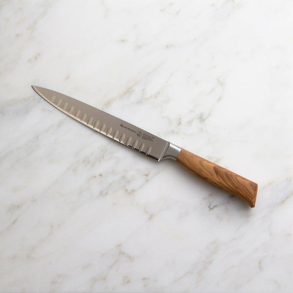 Buy online & save Oliva Elite Kullenschliff Carving Knife 8 Inch |Messermeister |BEON.COM.AU E6805 6         Oliva Elite 6 Inch Straight Carving Fork The Messermeister Oliva Elite 6 Inch Straight Carving Fork has a beautiful Mediterranean olive wood handle and fully forged fork tines. It is the idean accompaniment to any Messermeister carving knife. The straight tines hold meat in place ... Messermeister at BEON.COM.AU