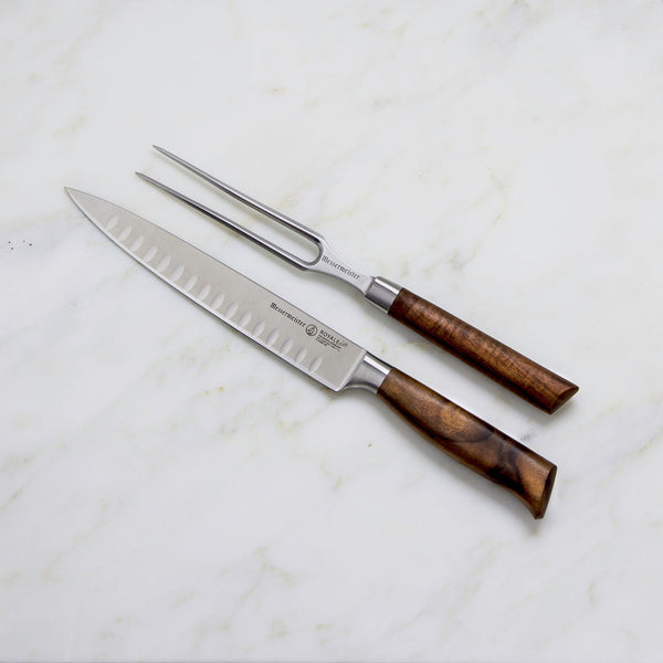 Buy online & save Royale Elite 2 Piece Kullenschliff Carving Set |Messermeister |BEON.COM.AU E9000 2KS         Royal Elite 2 Piece Kullenschliff Carving Set The Messermeister Royale Elité Carving Set consists of an 8 Inch Kullenschliff Carving Knife (E9688 8K) and a 6 Inch Straight Carving Fork (E9805 6). This is the perfect addition to your cutlery collection. Impress your guests by car... Messermeister at BEON.COM.AU