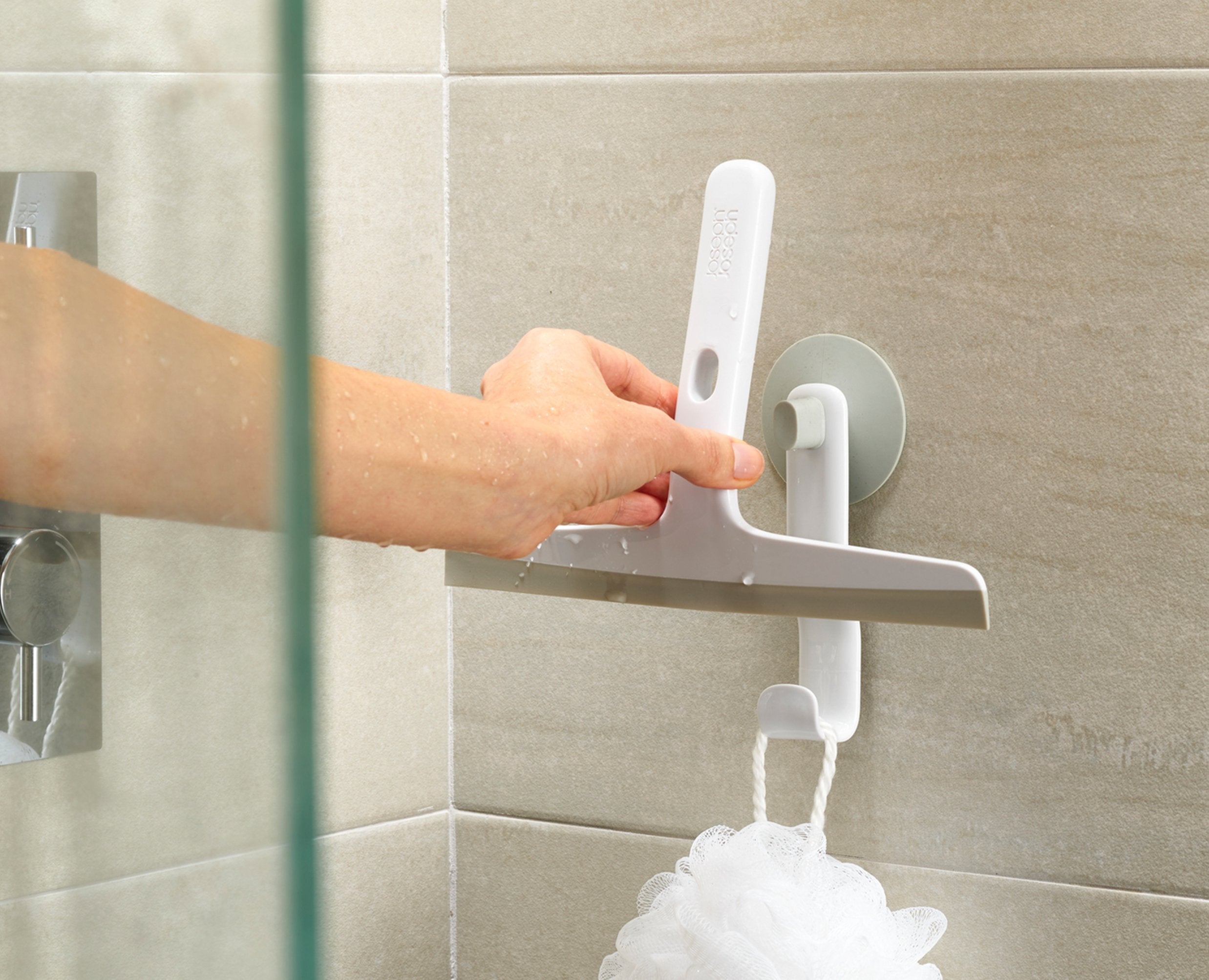 BEON.COM.AU  This compact shower squeegee comes with its own storage holder that attaches securely to tiles or a glass shower screen and includes a handy hook for hanging a range of bathroom accessories.  Slimline, space-saving design Flexible blade for precision cleaning Storage hook with suction-cup for at... Joseph Joseph at BEON.COM.AU
