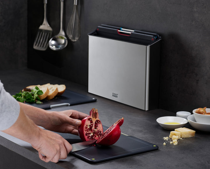 Buy online & save Folio™ Steel 4-piece Chopping Board Set | BEON.COM.AU Product Details This stunning set features a slimline case that holds four large chopping boards and makes a real statement on your worktop.  4 chopping boards with non-slip feet Knife-friendly, textured cutting surfaces Stainless-steel bars for easy board selection Fingerprint-proof stainless-st... Joseph Joseph at BEON.COM.AU