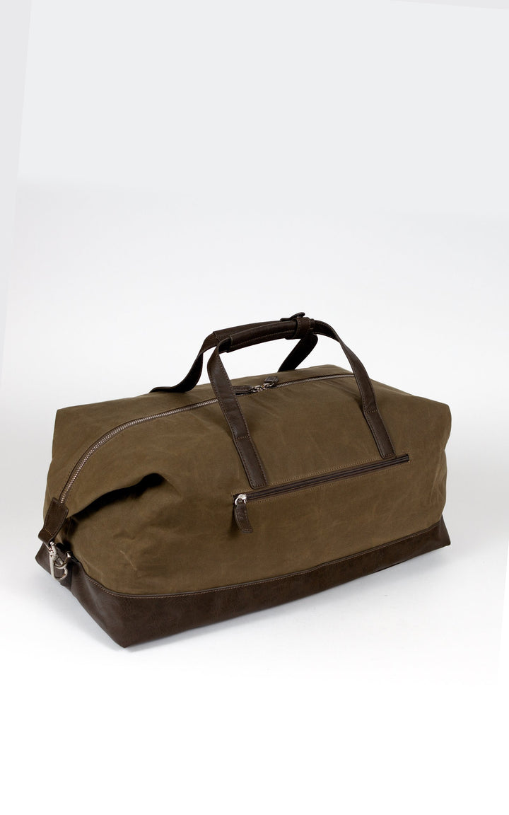 Buy online & save Goteborg Travel Bag | Olive |Jost |BEON.COM.AU The Jost Goteborg Travel Bag is a vegan leather and canvas bag.  Made of premium cotton, linen and raffia Large spacious compartment with internal organisation Outer compartment with zipper Shoulder strap adjustable and removable 25cm x 52cm x 24cm 25L Volume  Bags Jost at BEON.COM.AU