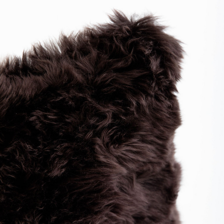 Buy and Save on The Hawkesbury Sheepskin Cushion - Cafecito Cushions | $1 of your purchase goes to the charity of your choice with i=Change® Add the premium Hawkesbury Sheepskin Cushion to your collection for a luxury hit of the softest all natural textur
