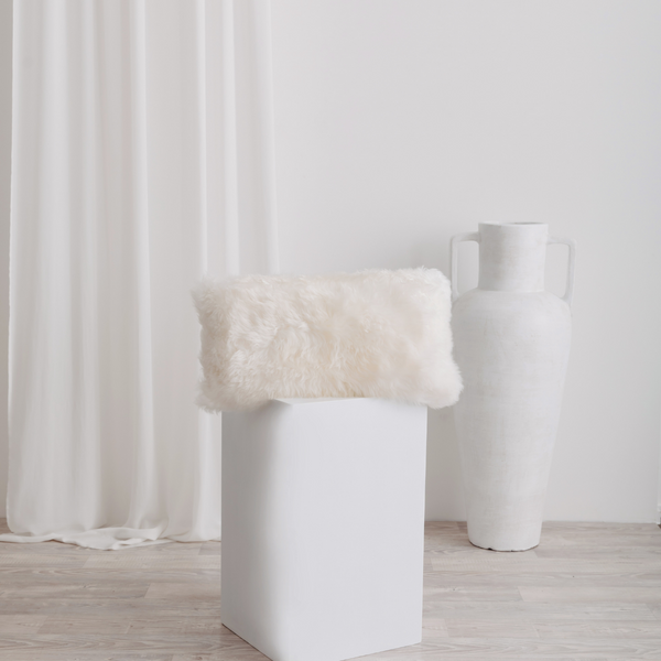 Buy and Save on The Hepburn Sheepskin Cushion - Ivory Cushions | The Hepburn Sheepskin Cushion adds extra texture to your beautifully designed spaces and provides comfort to keep your head on the clouds. Made from only natural materials; ethically sourced