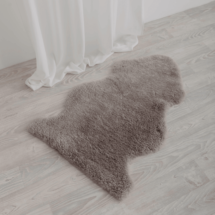 Buy and Save on The Kingston Sheepskin Rug Sheepskin Rugs | The Kingston Sheepskin Rug is an Australian classic reinvented. You'll find the perfect colour for your home from our beautiful array of modern, natural hues. Our short curly wool is only lightly