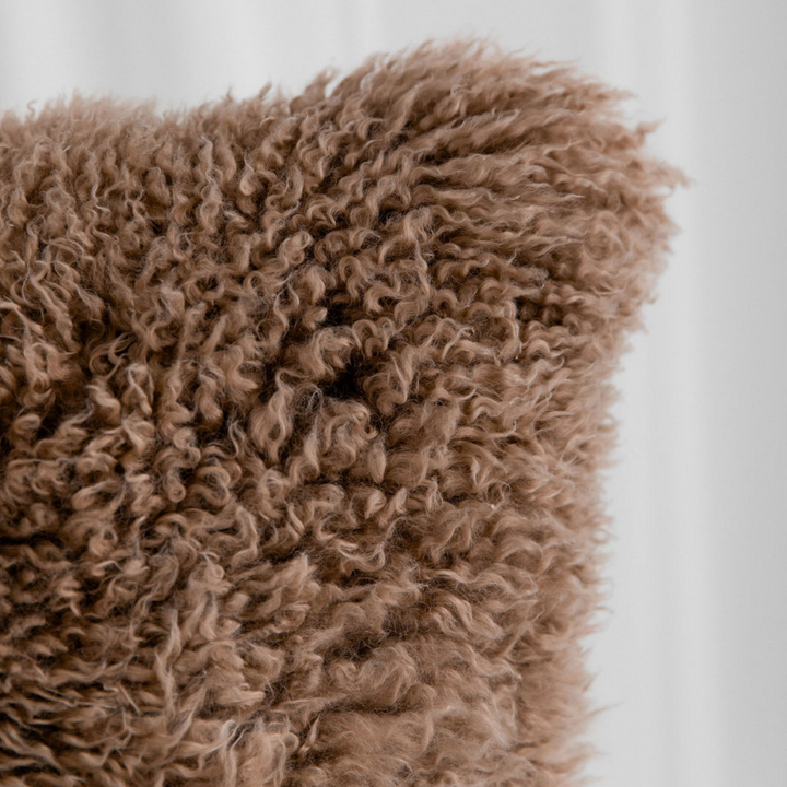 Buy and Save on The Hahndorf Sheepskin Cushions Cushions | Add a touch of luxury and pure comfort to your home with the delicate feel of long wool curly sheepskin. With two warm and neutral colours these cushions are a staple for all year around providing