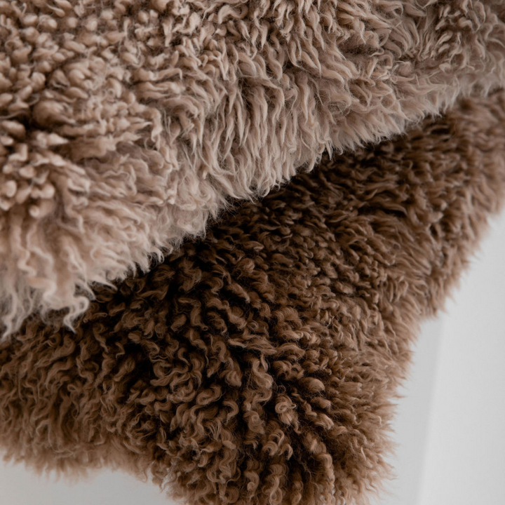 Buy and Save on The Hahndorf Sheepskin Cushions Cushions | Add a touch of luxury and pure comfort to your home with the delicate feel of long wool curly sheepskin. With two warm and neutral colours these cushions are a staple for all year around providing