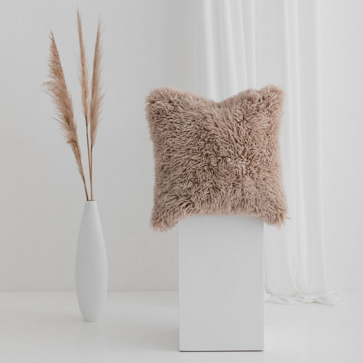 Buy and Save on The Hahndorf Sheepskin Cushions Cushions | Add a touch of luxury and pure comfort to your home with the delicate feel of long wool curly sheepskin. With two warm and neutral colours these cushions are a staple for all year around providing