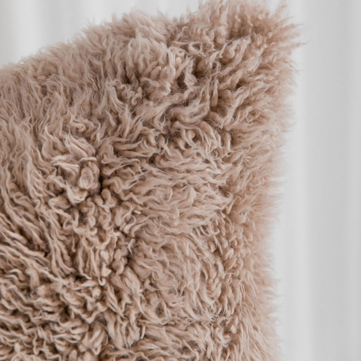 Buy and Save on The Hahndorf Sheepskin Cushions Cushions | Add a touch of luxury and pure comfort to your home with the delicate feel of long wool curly sheepskin. With two warm and neutral colours these cushions are a staple for all year around providing