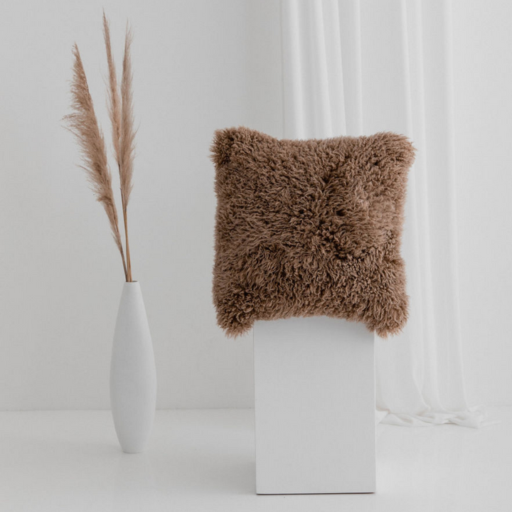 Buy and Save on The Hahndorf Sheepskin Cushions Cushions | Add a touch of luxury and pure comfort to your home with the delicate feel of long wool curly sheepskin. With two warm and neutral colours these cushions are a staple for all year around providing
