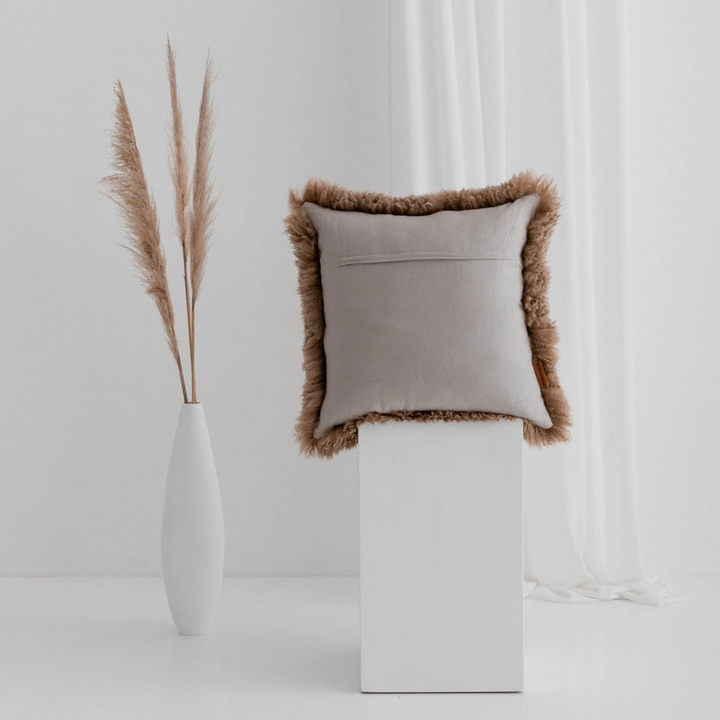 Buy and Save on The Hahndorf Sheepskin Cushions Cushions | Add a touch of luxury and pure comfort to your home with the delicate feel of long wool curly sheepskin. With two warm and neutral colours these cushions are a staple for all year around providing