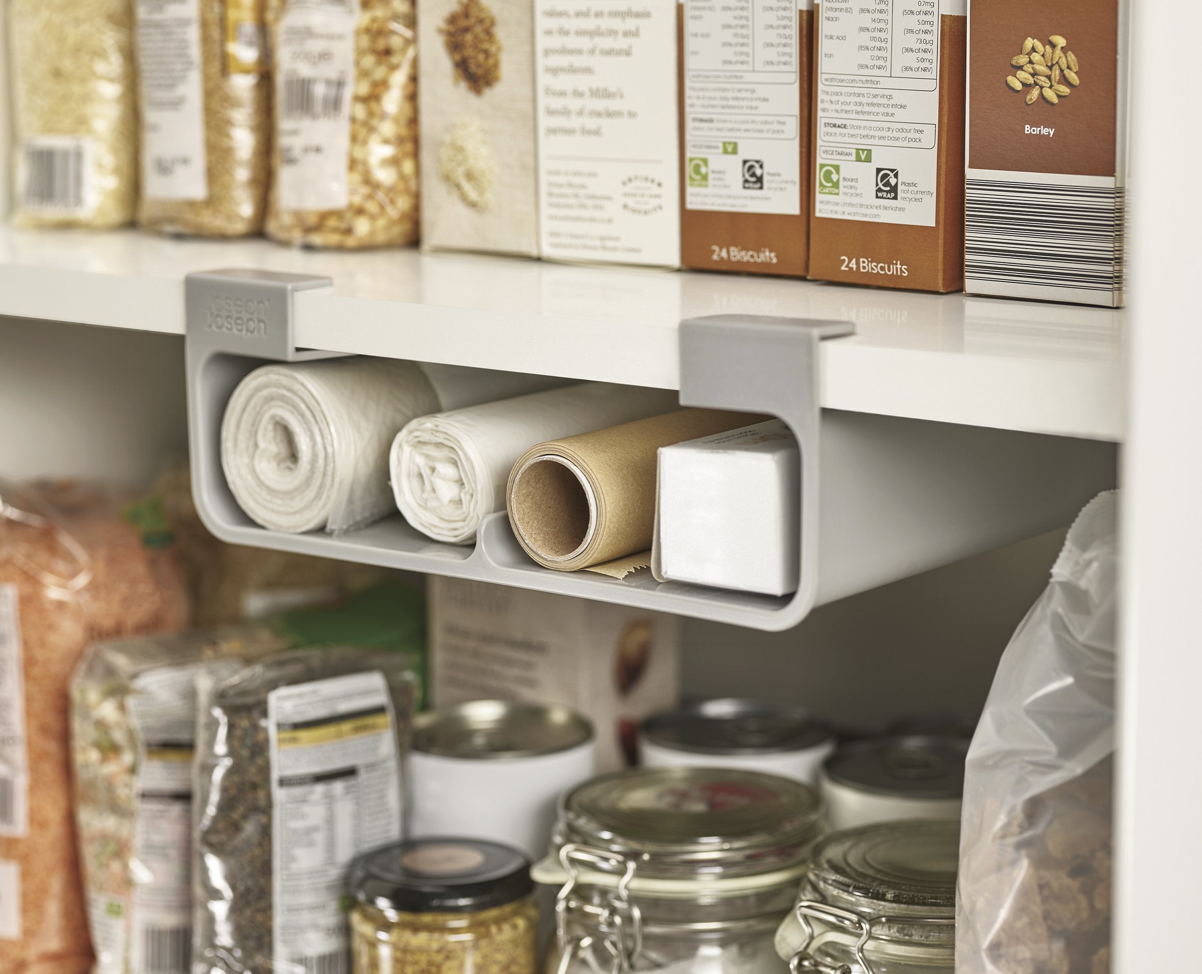 BEON.COM.AU  This innovative design makes use of unused space underneath your cupboard shelf with two open-ended compartments for storing rolls or boxes of cling film, baking foil, baking paper or bin liners.  Unique design utilises unused space beneath the shelf Perfect for holding boxes or rolls Easy tool-... Joseph Joseph at BEON.COM.AU