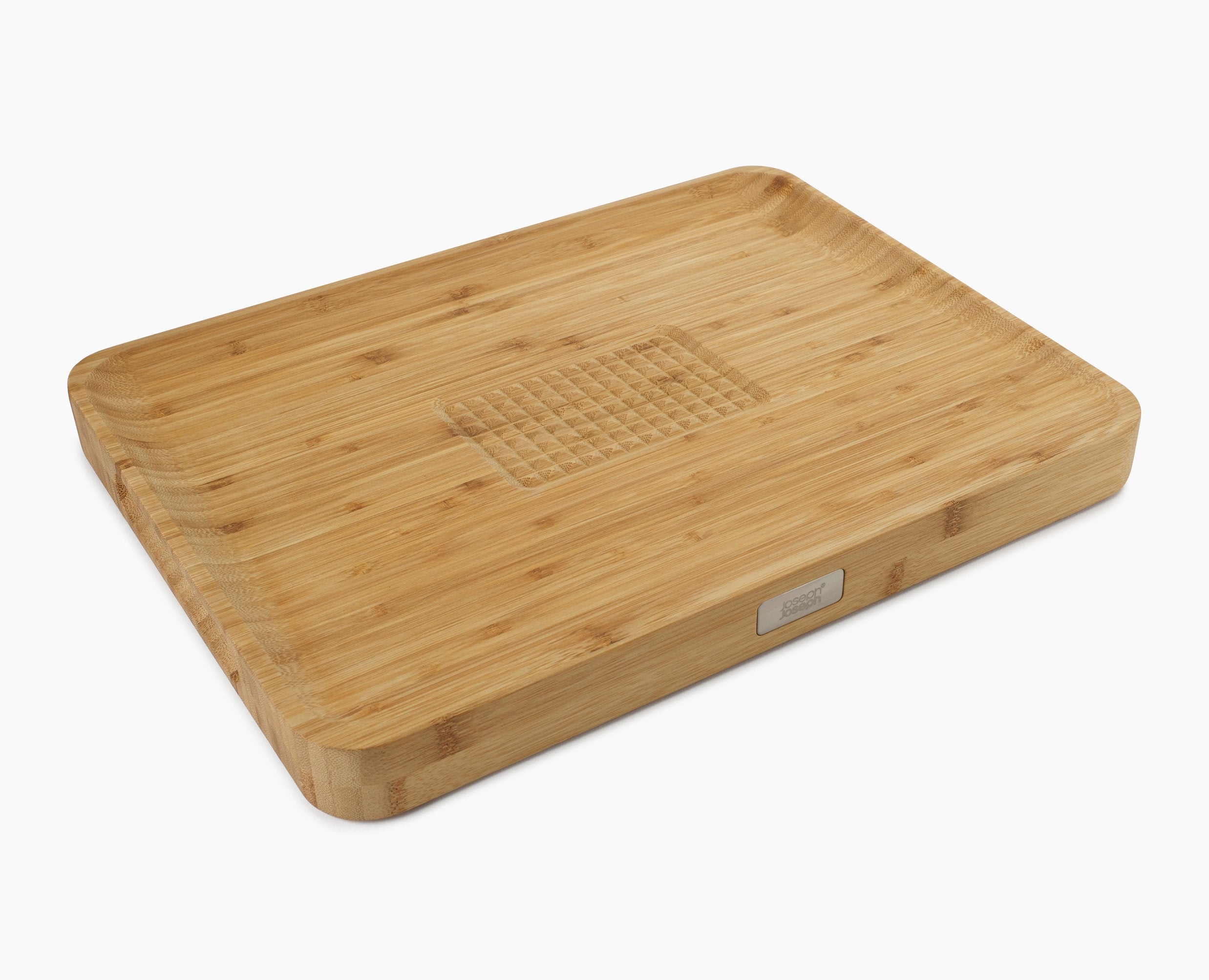 BEON.COM.AU  This heavy-duty bamboo chopping board features an integrated food grip to hold your meat, vegetables or bread in place while you cut and has an angled surface to collect any meat juices or breadcrumbs.  Angled cutting surface catches meat juices and bread crumbs Central food grip for holding mea... Joseph Joseph at BEON.COM.AU