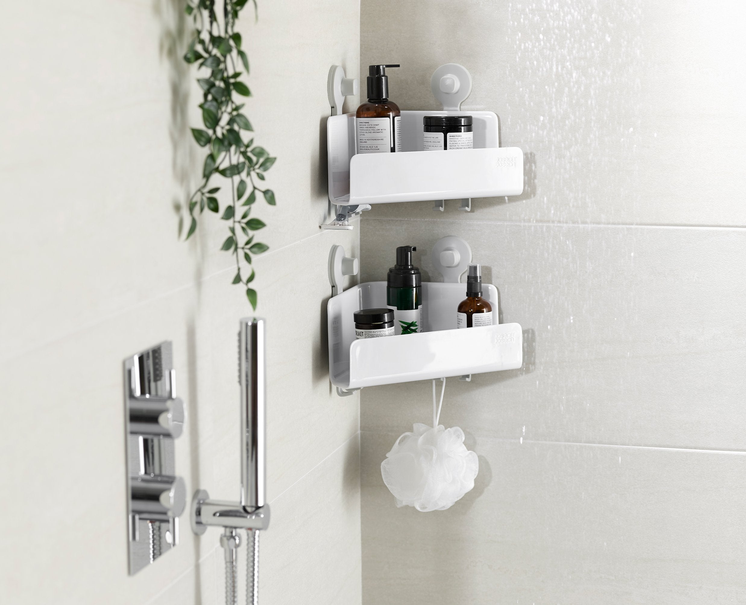 BEON.COM.AU  These corner shower shelves sit neatly in the corner of your shower to store your soap bars, shower gels and shampoo bottles and feature hooks for razors, sponges and flannels.  Self-draining design Handy storage hooks Lift-off shelf for easy cleaning  Easy tool-free installation using super-gri... Joseph Joseph at BEON.COM.AU