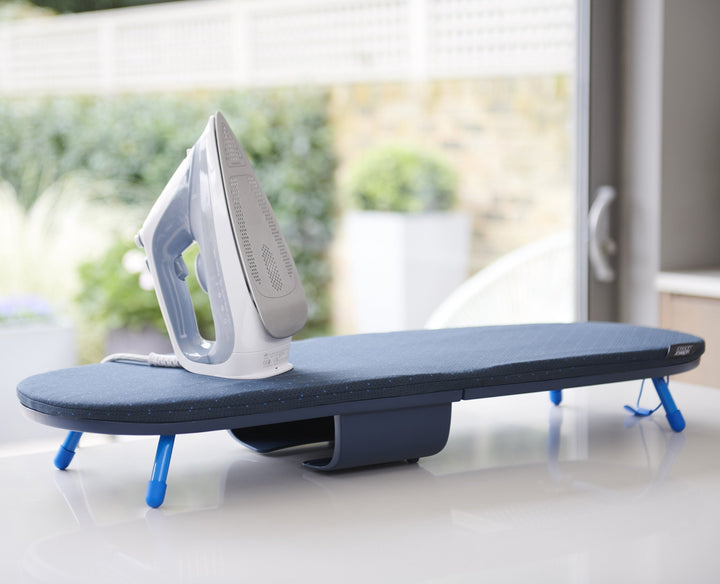 Buy online & save Pocket Plus Folding Ironing Board with Advanced Cover | BEON.COM.AU Product Details Designed to cope with larger volumes of ironing or for use with steam generator irons, this condensed board takes ironing convenience to whole new level with its innovative design and advanced, multi-layer cover with DripLock™ Technology.  Compact folding design Integrated iron st... Joseph Joseph at BEON.COM.AU