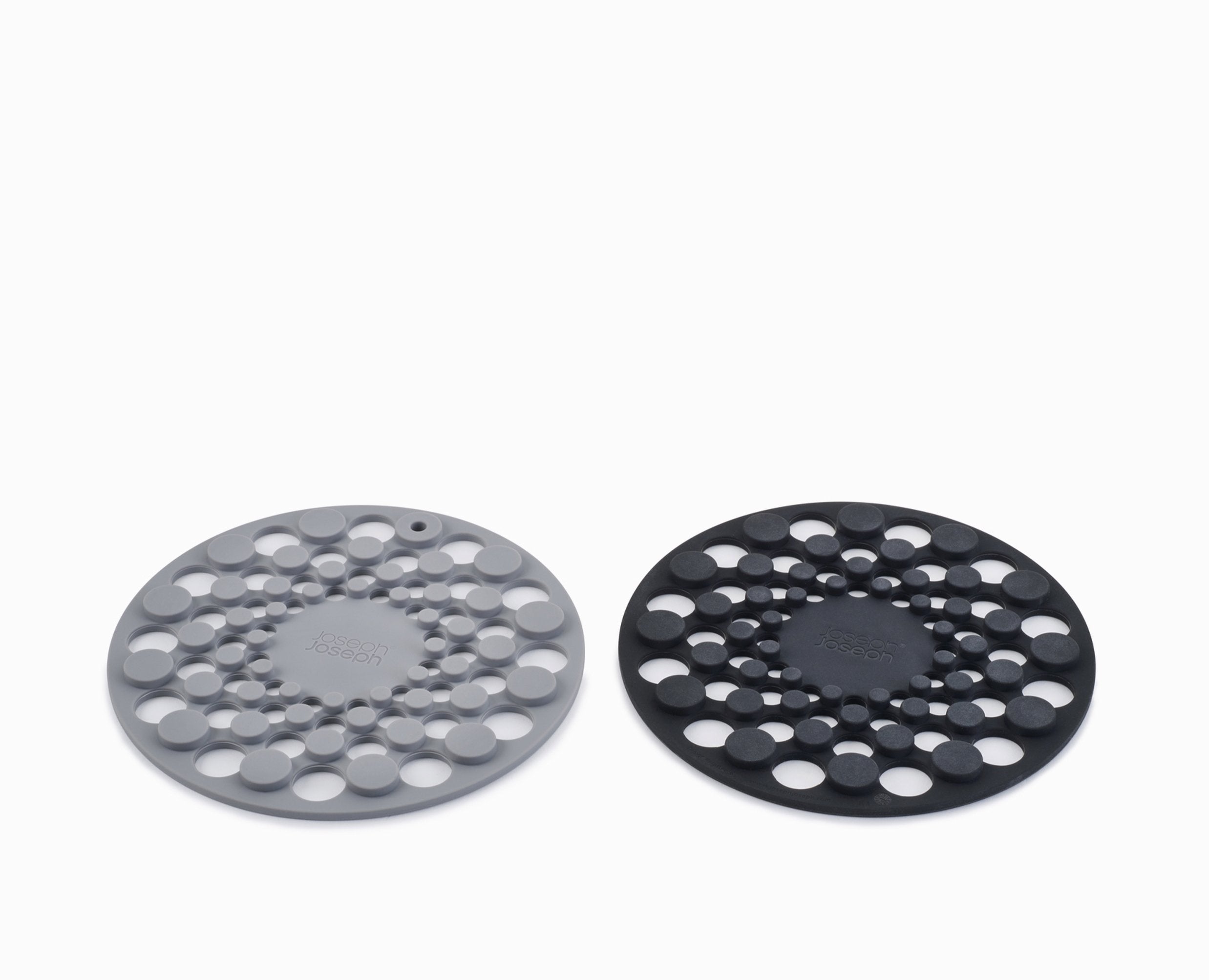BEON.COM.AU  These two heat and stain-resistant circular trivets fit neatly together for compact storage.  Heat-resistant up to 220˚C (428˚F) Protects surfaces from scratches and heat damage Stain-resistant Store together saving valuable drawer space Easy to clean - dishwasher safe  Specifications  Care &amp... Joseph Joseph at BEON.COM.AU