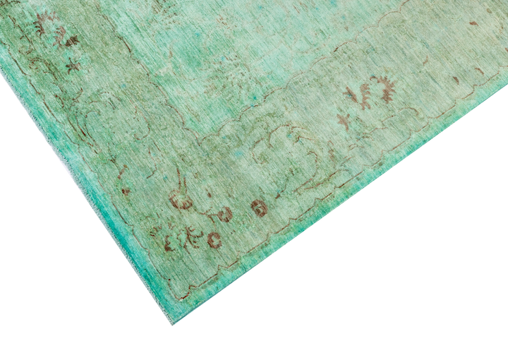 Buy Authentic Fine Afghan Over-Dyed Chobi In Green Afghan Rugs made in Afghanistan at BEON | This Chobi overdyed is a beautiful transitional rug in a muted distressed palette of soft green and blues colours. Hand knotted and meticulously crafted by Afghan