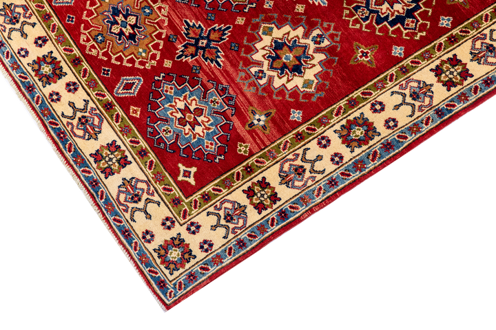 Buy Authentic Fine Afghan Kazak Afghan Rugs made in Afghanistan at BEON | Size: 152x217cmFoundation: CottonPile: Handspun WoolShape: Rectangular Hand knotted and meticulously crafted by Afghan artisans in Afghanistan, this stunning Chobi rug is made out o