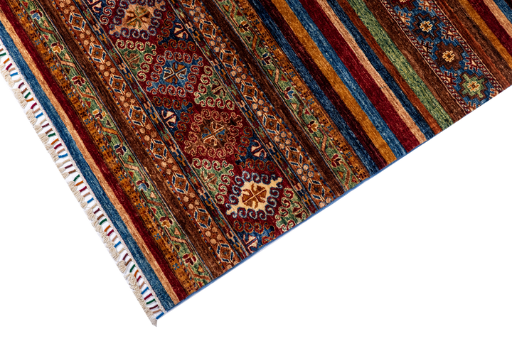 Buy Authentic Fine Afghan Khorjin Afghan Rugs made in Afghanistan at BEON | Size: 305x211cmFoundation: CottonPile: Handspun WoolShape: Rectangular Hand knotted and meticulously crafted by Afghan artisans in Afghanistan, this stunning Khorjin rug is made o