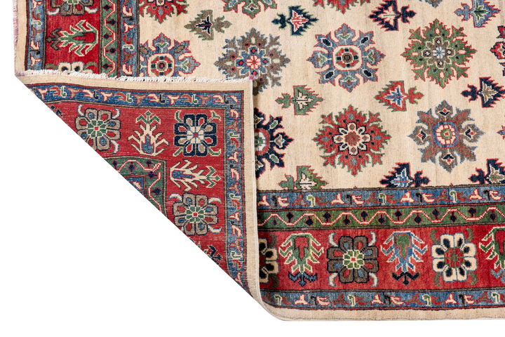 Buy Authentic Afghan Fine Kazak Afghan Rugs made in Afghanistan at BEON | Size: 200x290cmFoundation: CottonPile: Handspun WoolShape: Rectangular Hand knotted and meticulously crafted by Afghan artisans in Afghanistan, this stunning Kazak rug is made out o