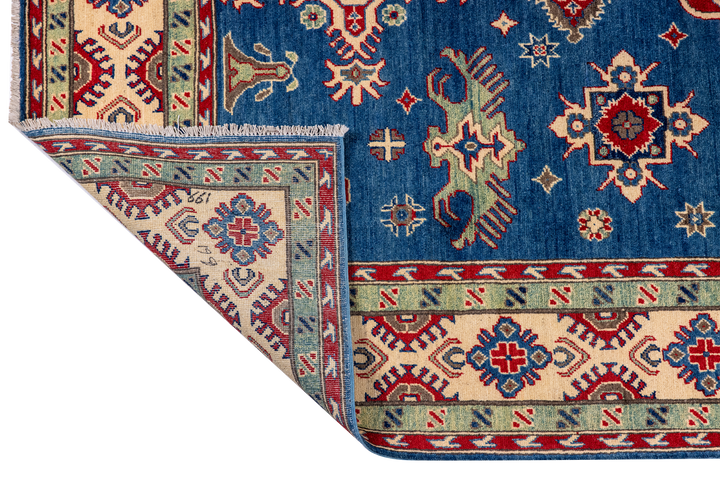 Buy Authentic Afghan Super Fine Kazak Afghan Rugs made in Afghanistan at BEON | Size: 200x300cmFoundation: CottonPile: Handspun WoolShape: Rectangular Hand knotted and meticulously crafted by Afghan artisans in Afghanistan, this stunning Kazak rug is made