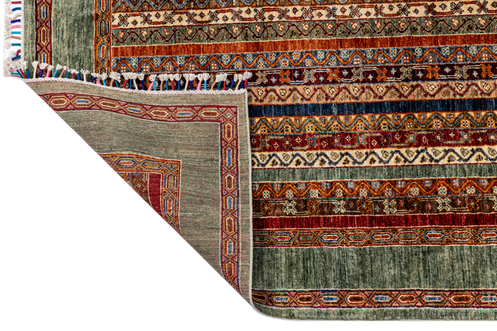 Buy Authentic Afghan Fine Ariana Chobi Afghan Rugs made in Afghanistan at BEON | Size: 207x301cmFoundation: CottonPile: Handspun WoolShape: Rectangular Hand knotted and meticulously crafted by Afghan artisans in Afghanistan, this stunning Ariana Chobi rug