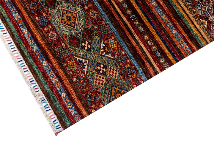 Buy Authentic Afghan Fine Khorjin Afghan Rugs made in Afghanistan at BEON | Size: 178x248cmFoundation: CottonPile: Handspun WoolShape: Rectangular Hand knotted and meticulously crafted by Afghan artisans in Afghanistan, this stunning Khorjin rug is made o