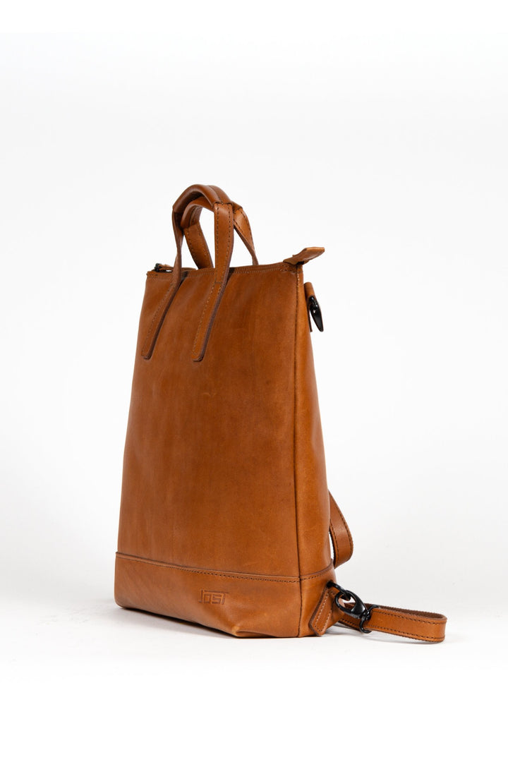 Buy online & save Futura X-Change Bag XS | Cognac |Jost |BEON.COM.AU The Jost Futura X-Change Small is a leather bag made in Europe from premium European leathers and fabrics. 3 in 1 bag that can be worn as a backpack, shoulder bag and handbag Made in smooth cowhide with pull-up effect Fits up to 13" laptop Closes with zipper Padded laptop compartment Small e... Jost at BEON.COM.AU