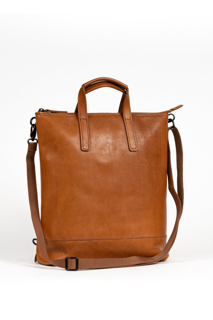 Buy online & save Futura X-Change Bag XS | Cognac |Jost |BEON.COM.AU The Jost Futura X-Change Small is a leather bag made in Europe from premium European leathers and fabrics. 3 in 1 bag that can be worn as a backpack, shoulder bag and handbag Made in smooth cowhide with pull-up effect Fits up to 13" laptop Closes with zipper Padded laptop compartment Small e... Jost at BEON.COM.AU