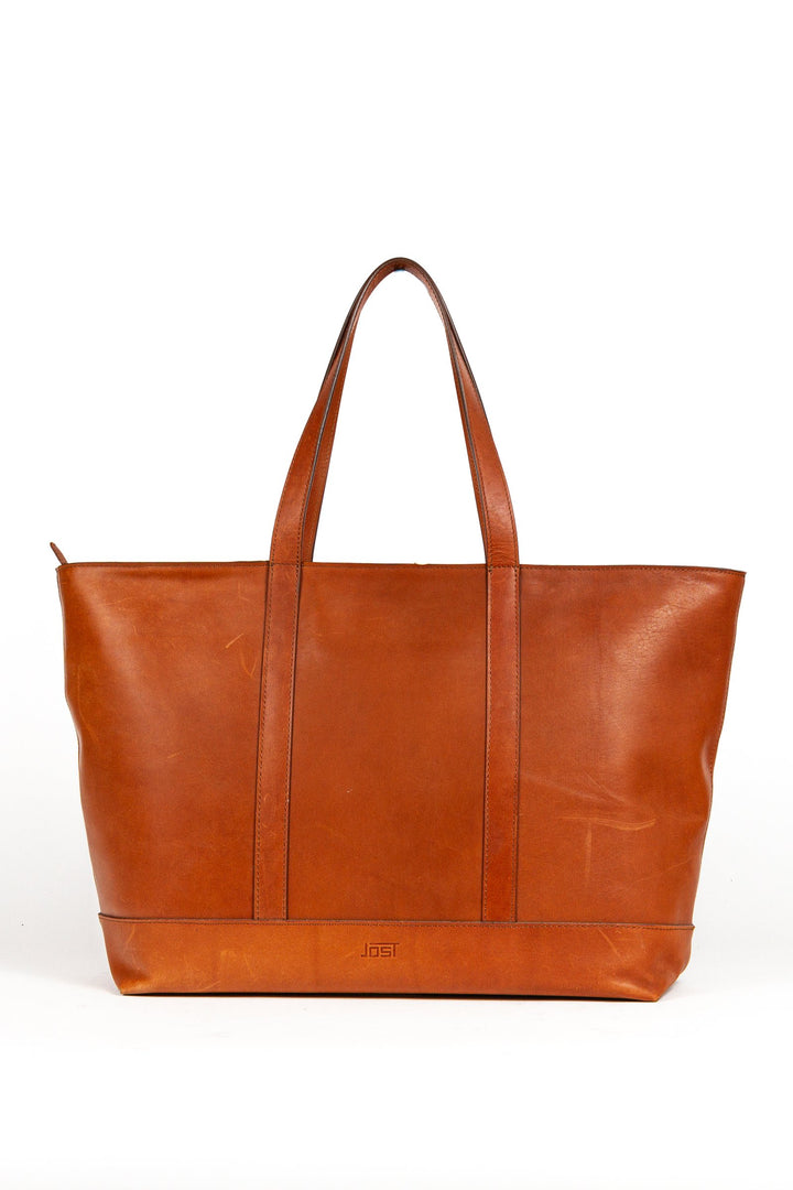 Buy online & save Futura Carryall | Cognac |Jost |BEON.COM.AU The Jost Futura Carryall is a leather bag made in Europe from premium European leathers and fabrics. 1 main compartment Inner compartments / organiser, inner compartment with zipper, fits A4 landscape Shoulder strap adjust-and removable 35cm x 55cm x 17cm 14L volume Bags Jost at BEON.COM.AU