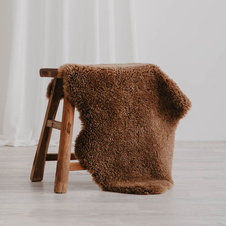 Buy and Save on The Kingston Sheepskin Rug Sheepskin Rugs | The Kingston Sheepskin Rug is an Australian classic reinvented. You'll find the perfect colour for your home from our beautiful array of modern, natural hues. Our short curly wool is only lightly