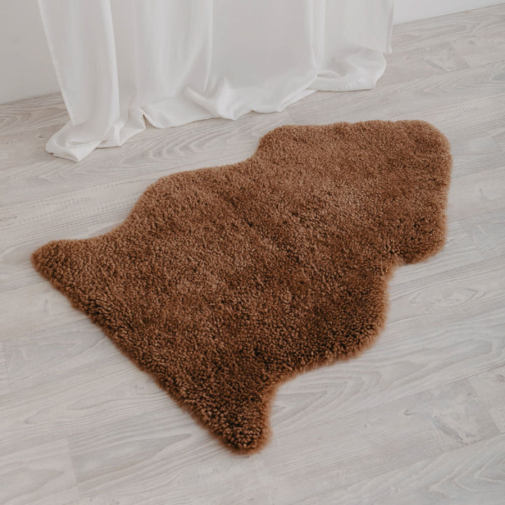 Buy and Save on The Kingston Sheepskin Rug Sheepskin Rugs | The Kingston Sheepskin Rug is an Australian classic reinvented. You'll find the perfect colour for your home from our beautiful array of modern, natural hues. Our short curly wool is only lightly