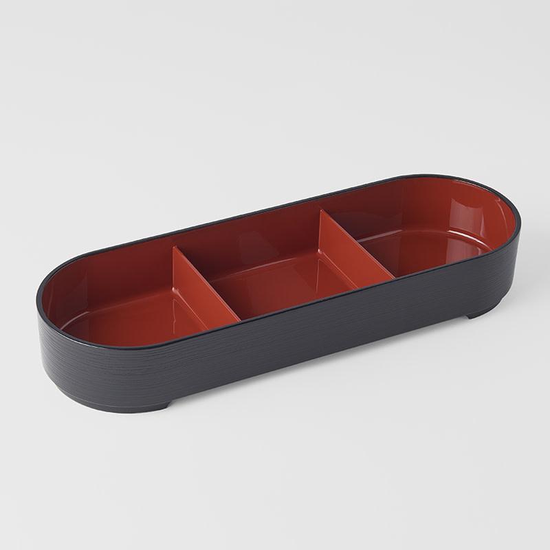 Save on Bento Box Oval Made in Japan at BEON. 36cm length x 12.5cm width x 6cm height 3 Section Oval Bento Box Black with Red Inner Perfect to serve your favourite foods. Use as a lunch box, take with you on a picnic or use to store jewellery or other nic nacs. Pair with the bento box lid to make a complete bento box. Made in Japan