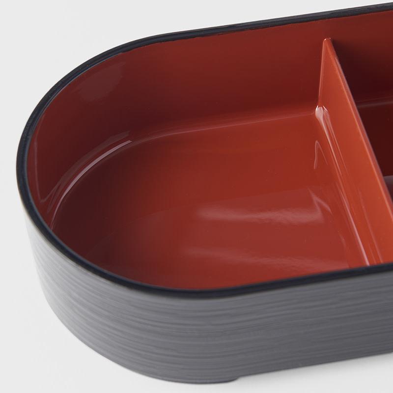 Save on Bento Box Oval Made in Japan at BEON. 36cm length x 12.5cm width x 6cm height 3 Section Oval Bento Box Black with Red Inner Perfect to serve your favourite foods. Use as a lunch box, take with you on a picnic or use to store jewellery or other nic nacs. Pair with the bento box lid to make a complete bento box. Made in Japan