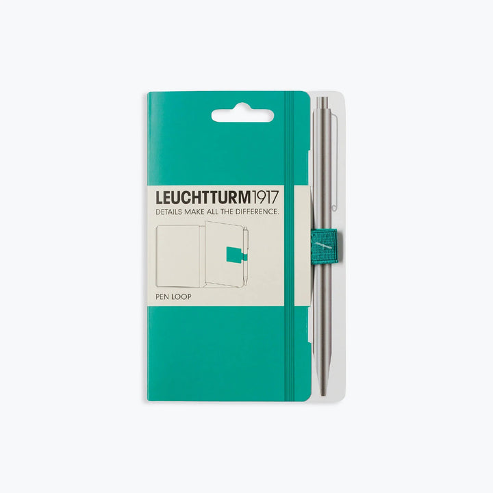 Leuchtturm1917 - Pen Loop - Emerald <Outgoing> Pen Loops & Straps The emerald Leuchtturm1917 self-adhesive loop sticks on the inside back cover of any notebook, making it easy to carry your favourite writing instrument with the notebook at all times. The