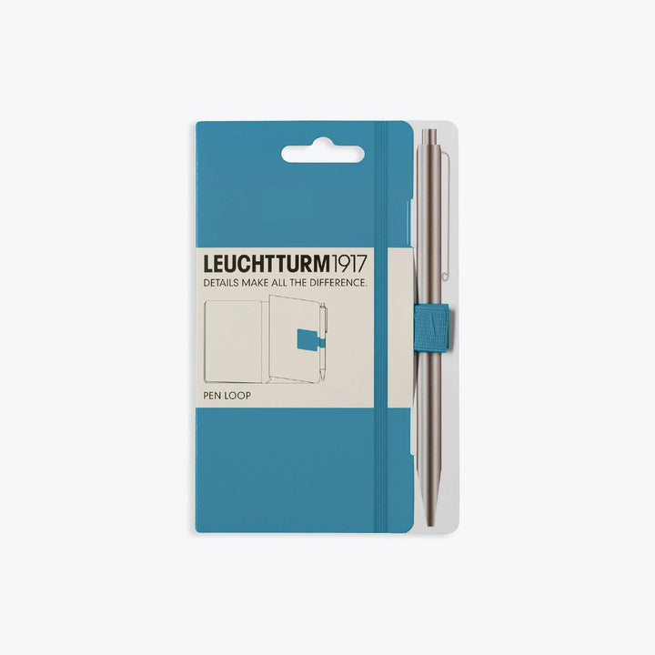 Leuchtturm1917 - Pen Loop - Nordic Blue <Outgoing> Pen Loops & Straps The nordic blue Leuchtturm1917 self-adhesive loop sticks on the inside back cover of any notebook, making it easy to carry your favourite writing instrument with the notebook at all tim