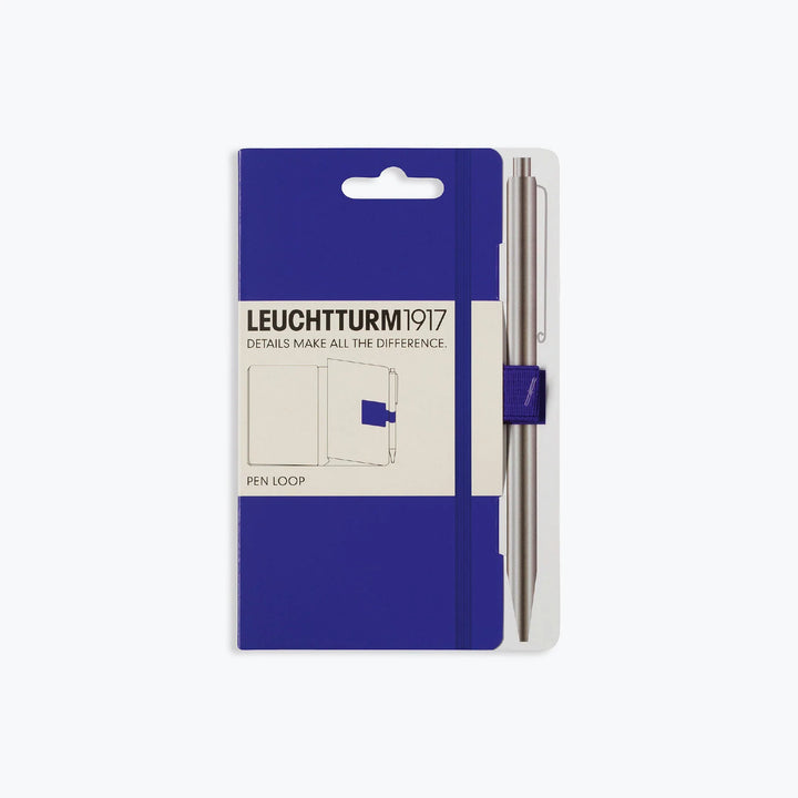 Leuchtturm1917 - Pen Loop - Purple <Outgoing> Pen Loops & Straps The purple Leuchtturm1917 self-adhesive loop sticks on the inside back cover of any notebook, making it easy to carry your favourite writing instrument with the notebook at all times. The pe