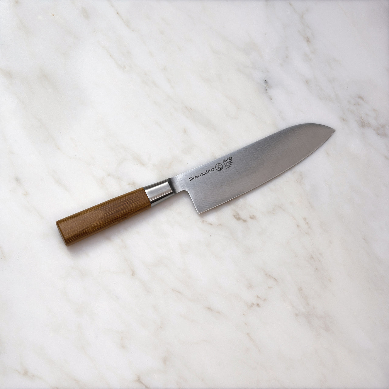 BEON.COM.AU MU 03      Mu Bamboo Santoku Knife The Messermeister Mu Bamboo 6.5" Santoku Knife, also known as a Japanese Chefs Knife, is a wide blade knife with an overall thinner spine and taper than a French or German style Chefs Knife. The thin taper (or blade thickness) is lengthened to give it maxim... Messermeister at BEON.COM.AU
