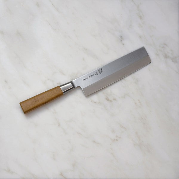 Buy online & save Mu Bamboo Usuba Knife 7 Inch (17.8cm) |Messermeister |BEON.COM.AU MU 08      Mu Bamboo Usuba Knife The Messermeister Mu Bamboo 7" Usuba Knife is a broad bladed single edge blade with a distinctively curved tip or a blunt tip and looks like a vegetable cleaver. The usual blade length is 180 mm. It is traditionally used like a paring knife by holding it in t... Messermeister at BEON.COM.AU