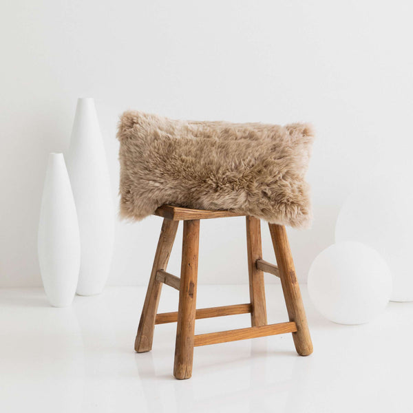 Buy and Save on The Hepburn Sheepskin Cushion - Bone Cushions | The Hepburn Sheepskin Cushion adds extra texture to your beautifully designed spaces and provides comfort to keep your head on the clouds. Made from only natural materials; ethically sourced