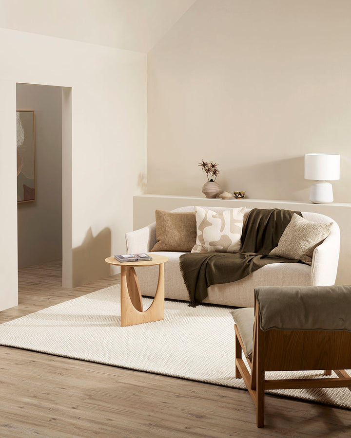 Altona Throw Add a pared-back accent to your space with the lightweight softness of Altona. Finely woven from a blend of wool and recycled polyester, the solid colour and delicate fringe edge makes this piece easy to style into most interior schemes. The