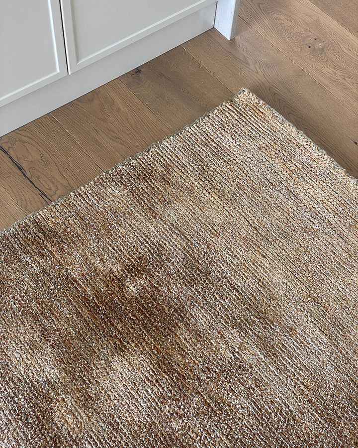 Anchorage Floor Runner Create a welcoming entrance or passageway with this simple, natural fibre runner. A blend of bamboo and jute yarns gives the tufted surface subtle colour graduations, while the sand tone gives a thoughtfully crafted, natural feel to